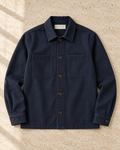 the canvas overshirt in navy · östermalm — flat lay