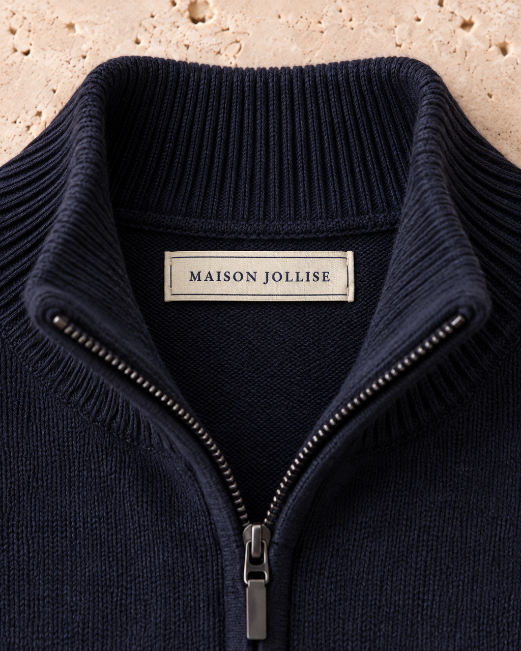 the merino quarter-zip in navy · östermalm — woven neck label