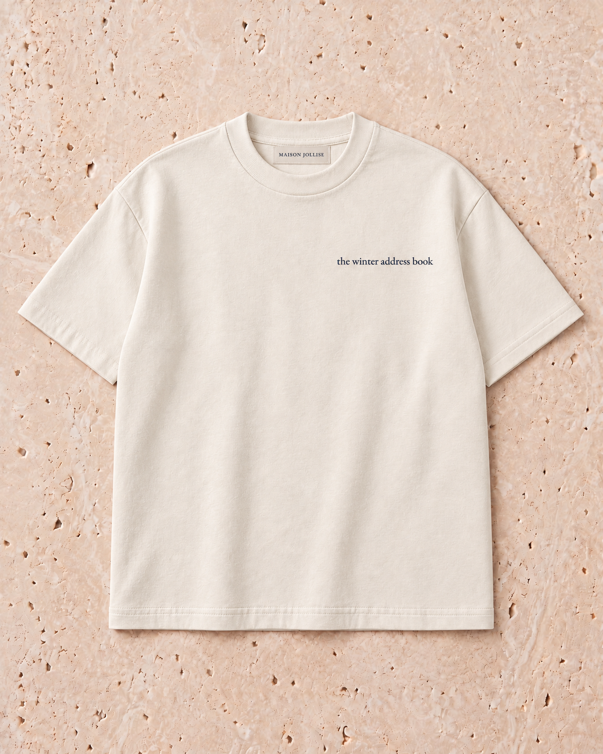 the winter address book tee in ivory — front