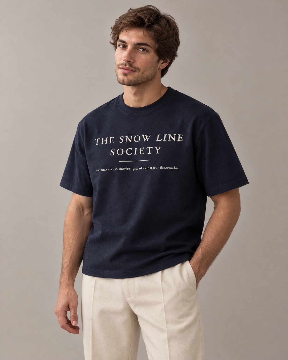 the snow line society tee — on him