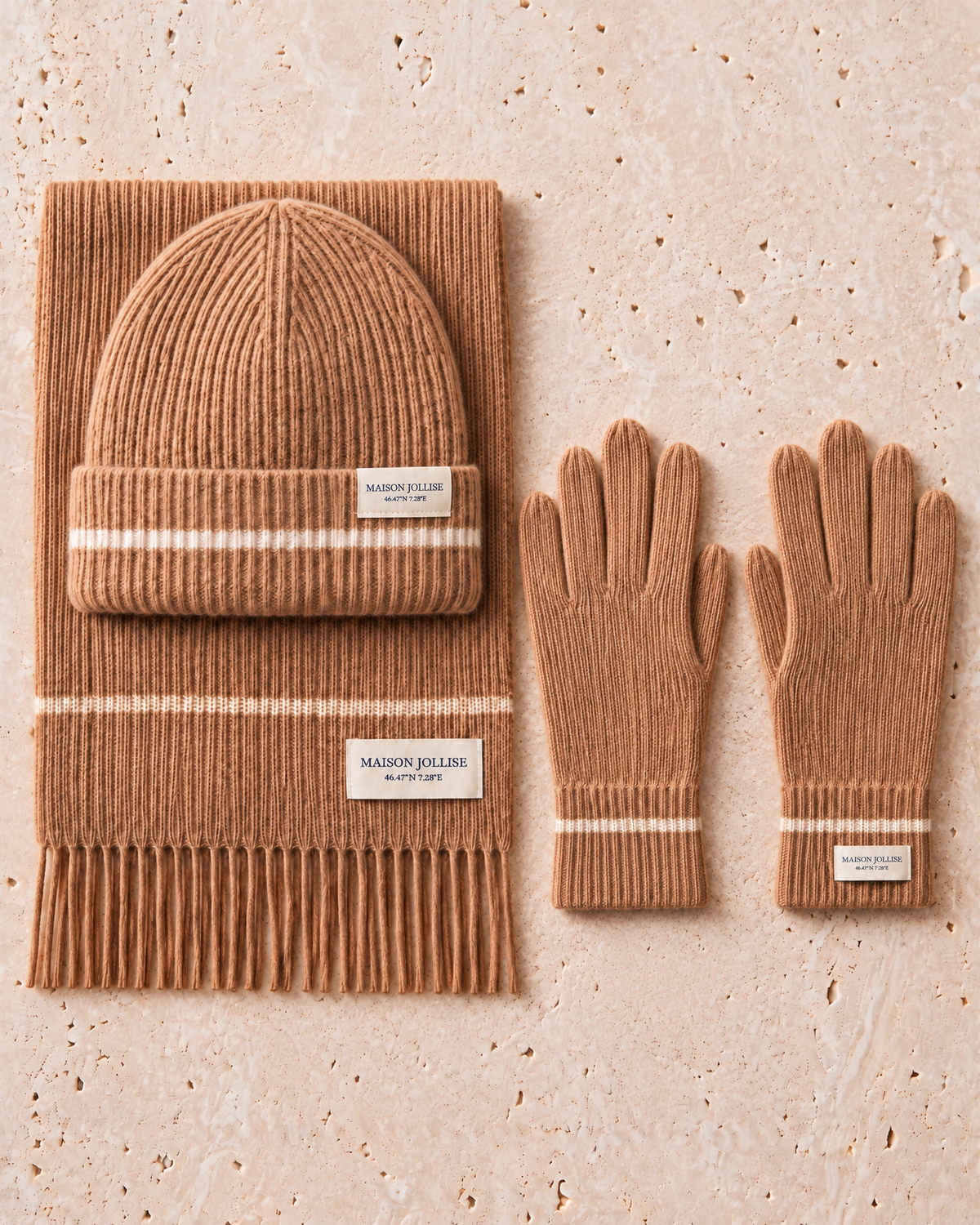 the snow line trio in camel · gstaad — flat lay of the beanie, scarf and gloves