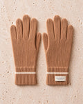 the snow line cashmere gloves in camel · gstaad — flat lay