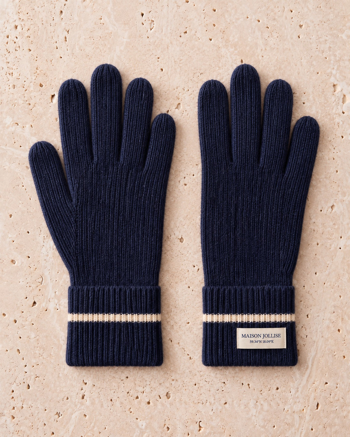 the snow line cashmere gloves in navy · östermalm — flat lay