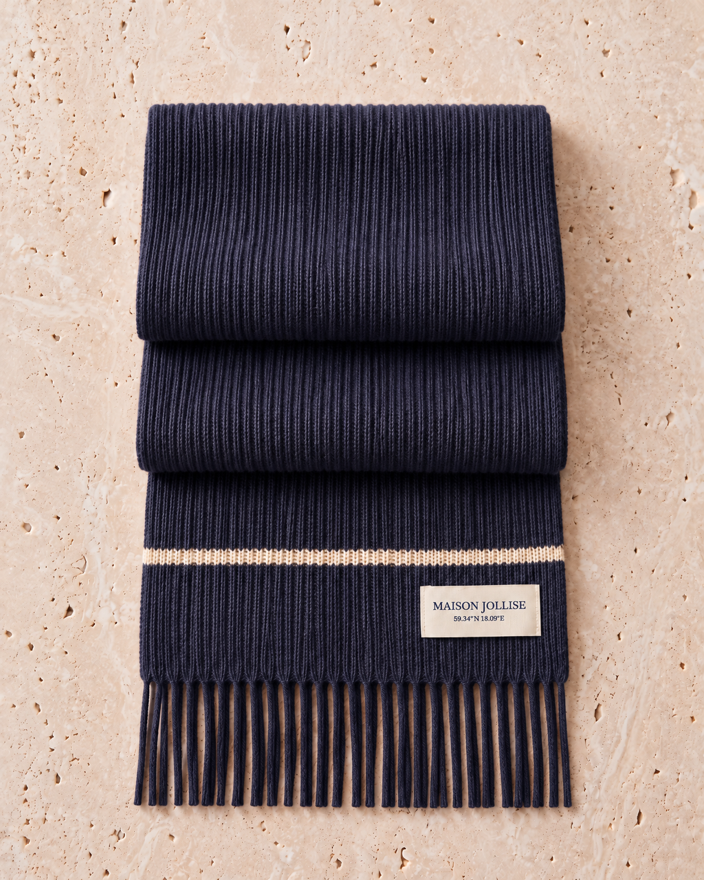 the snow line scarf in navy · östermalm, folded