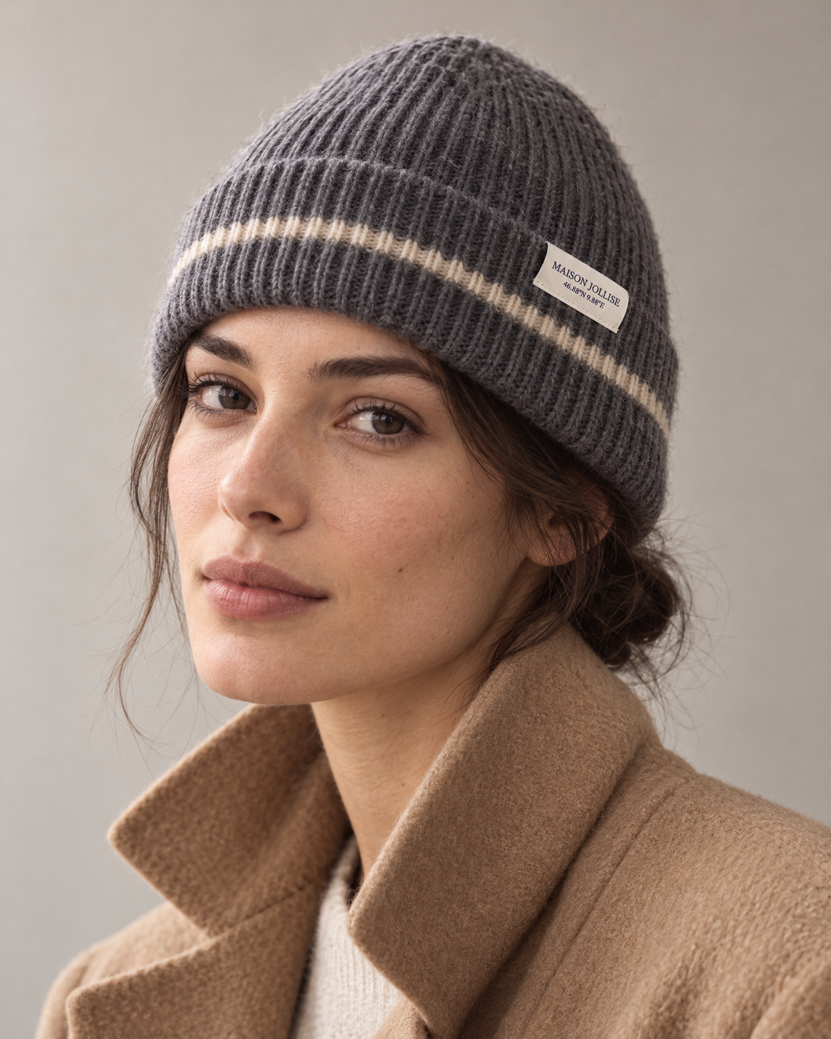 the snow line beanie in charcoal · klosters, worn in the studio