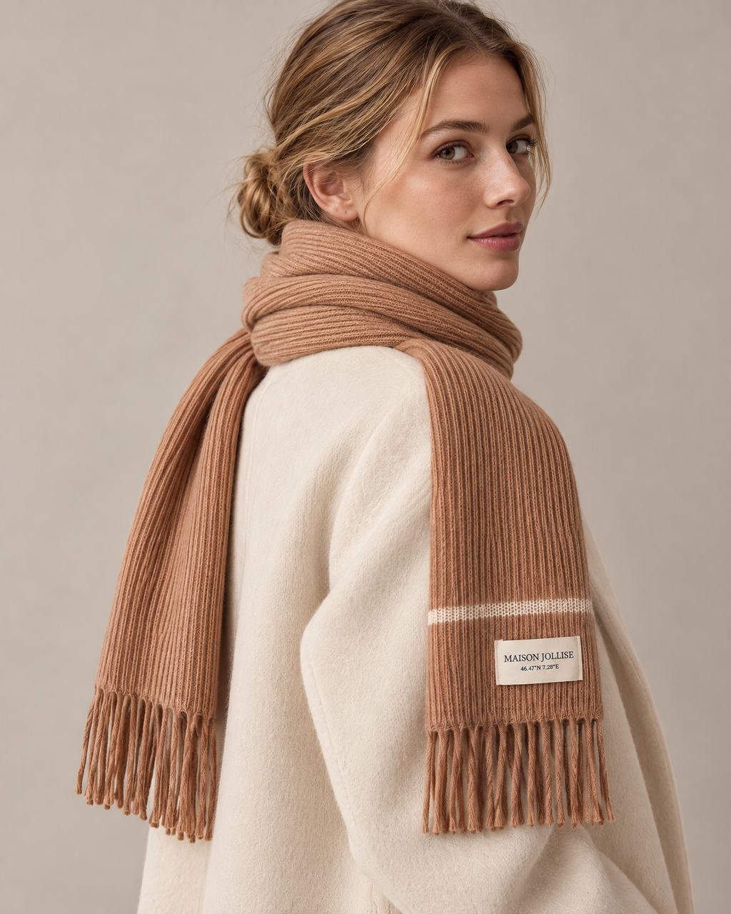 the snow line scarf in camel · gstaad, over the shoulder