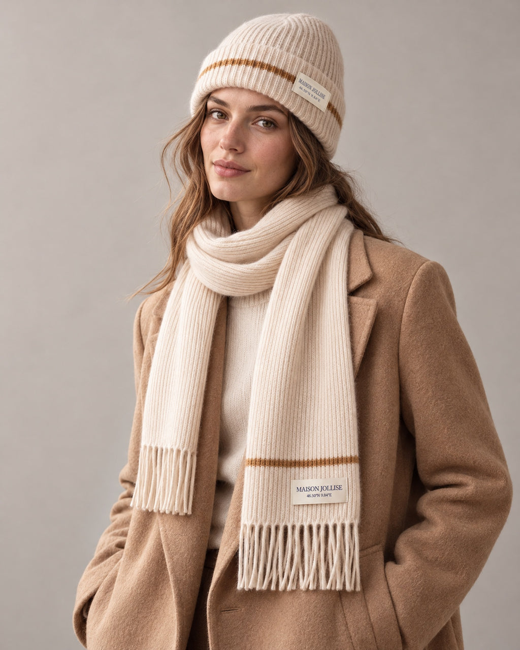 the snow line set in ivory · st. moritz, beanie and scarf worn together in the studio
