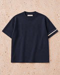 the heavyweight tee in navy · östermalm — flat lay